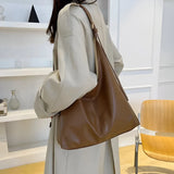 Leather Shoulder Bag with Button Closure