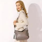 Stylish Leather Crossbody Bag with Tassel Details