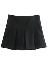 Vintage high-waisted pleated mini skirt