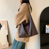 Leather Shoulder Bag with Button Closure