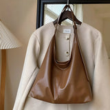 Leather Shoulder Bag with Button Closure