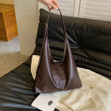Leather Shoulder Bag with Button Closure