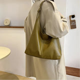 Leather Shoulder Bag with Button Closure