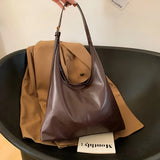 Leather Shoulder Bag with Button Closure